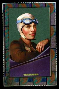 Picture, Helmar Brewing, Daredevil Newsmakers Card # 8, Amelia Earhart, sitting in cockpit, blue goggles, Female Aviator